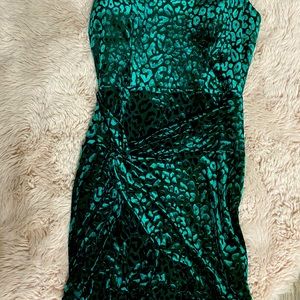 A spaghetti strap velvet leopard print dress?